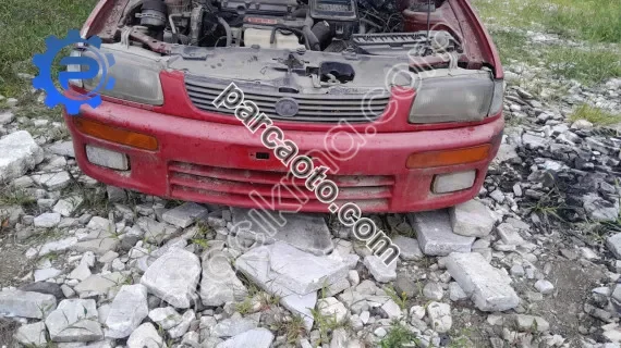 Mazda 323 family ön tampon dolu çıkma